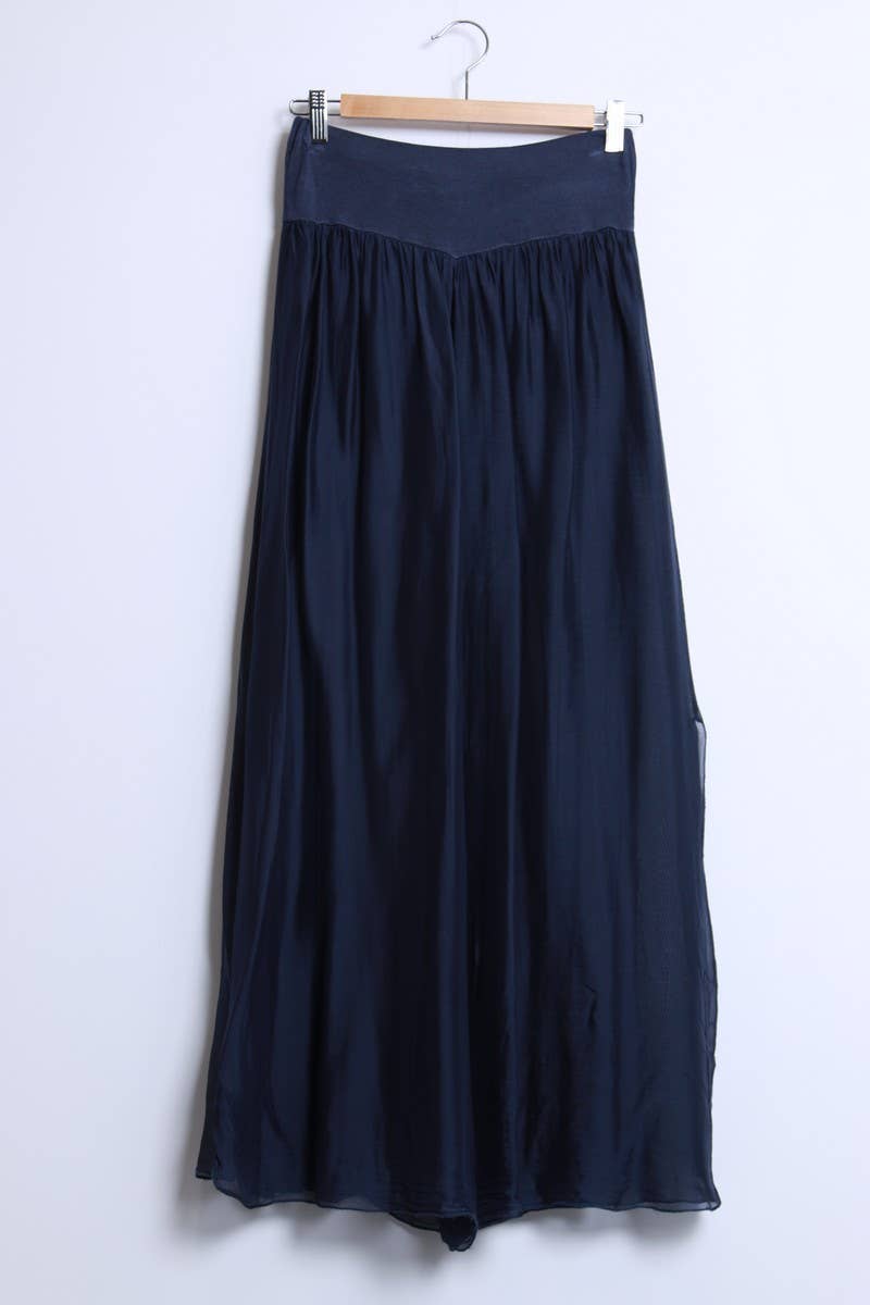 Silk pants open on the sides at the bottom