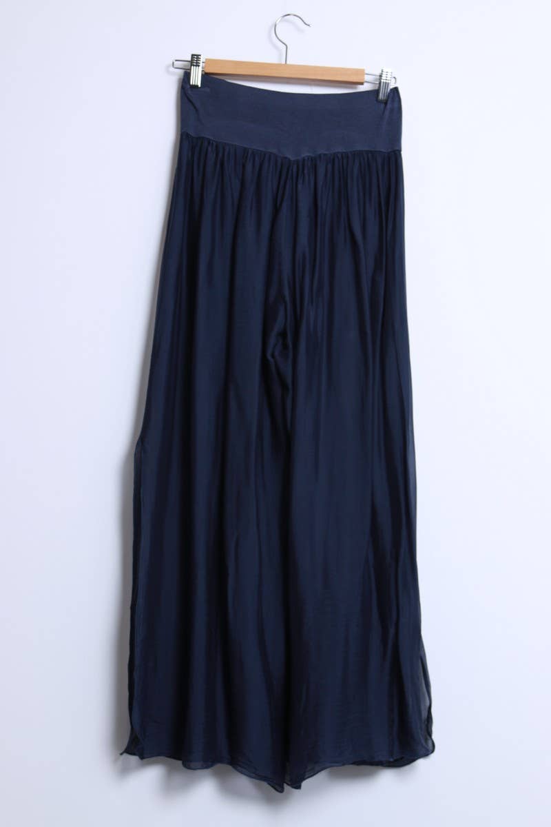 Silk pants open on the sides at the bottom