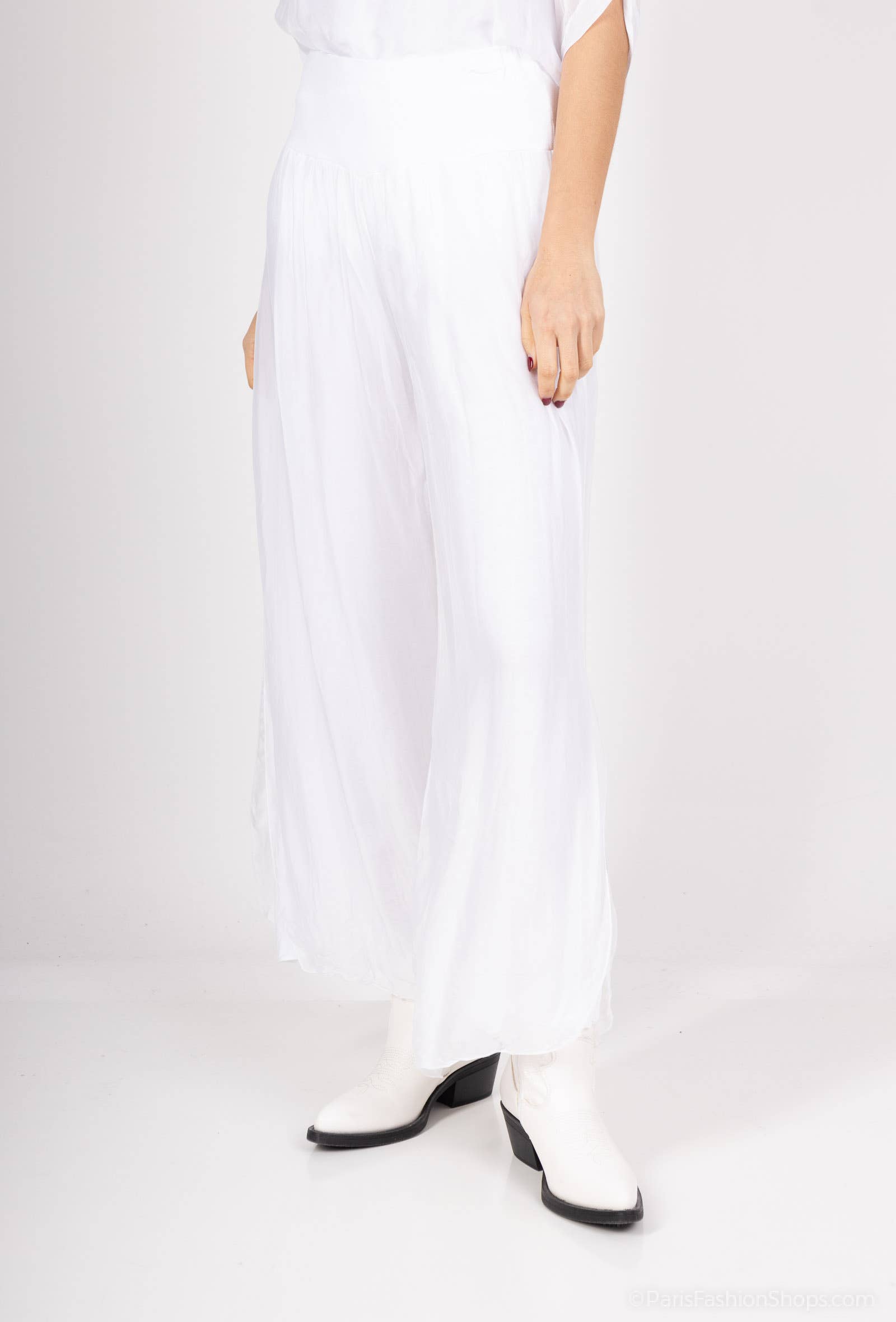 Silk pants open on the sides at the bottom