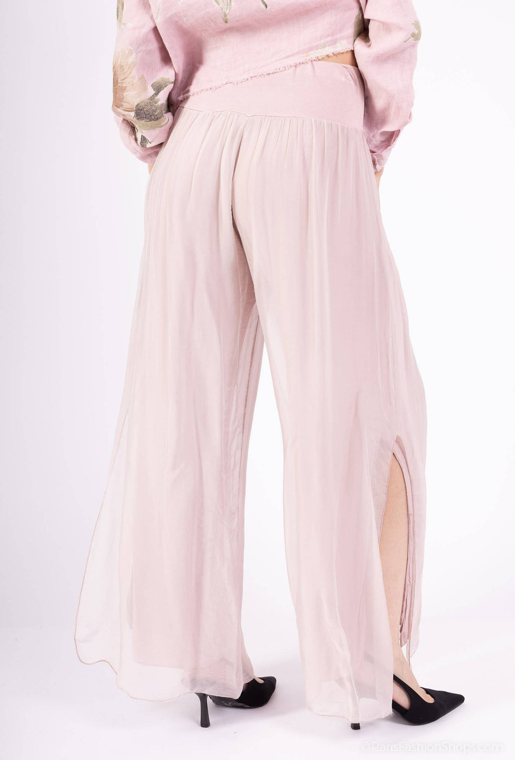 Silk pants open on the sides at the bottom