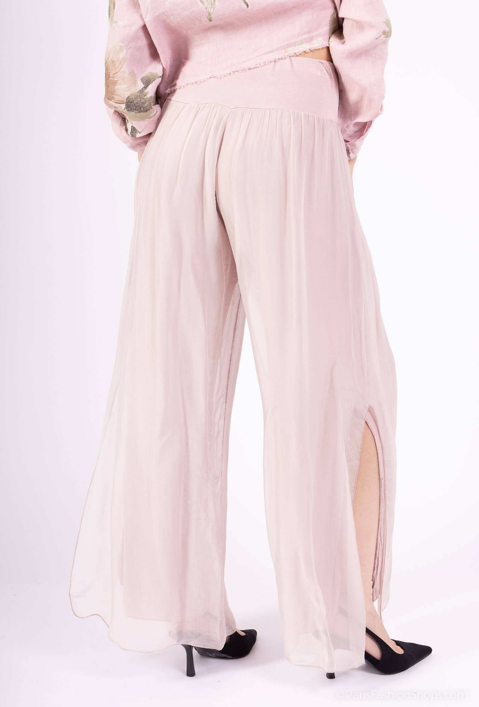Silk pants open on the sides at the bottom