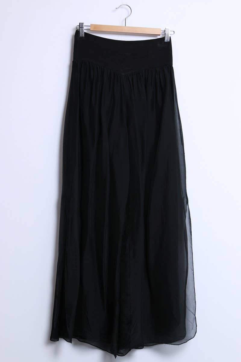 Silk pants open on the sides at the bottom
