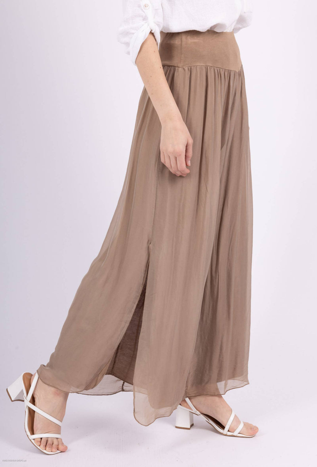 Silk pants open on the sides at the bottom
