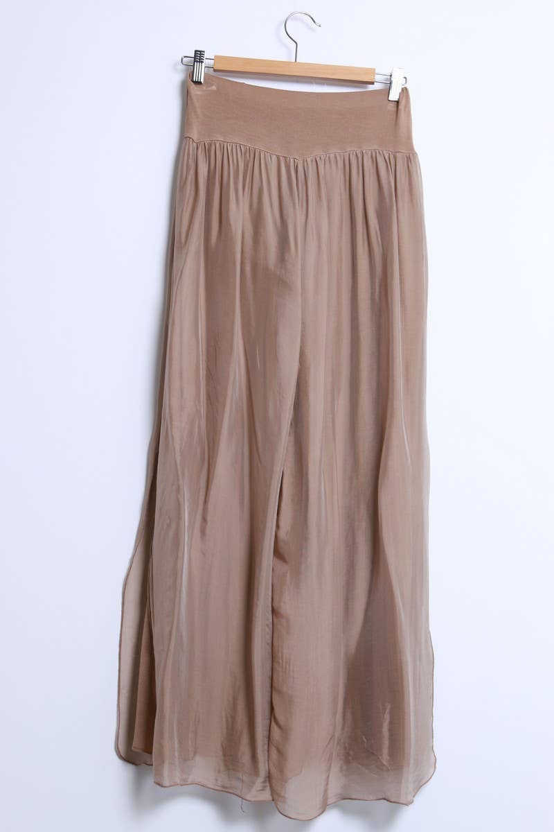 Silk pants open on the sides at the bottom