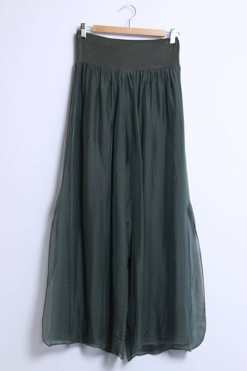 Silk pants open on the sides at the bottom