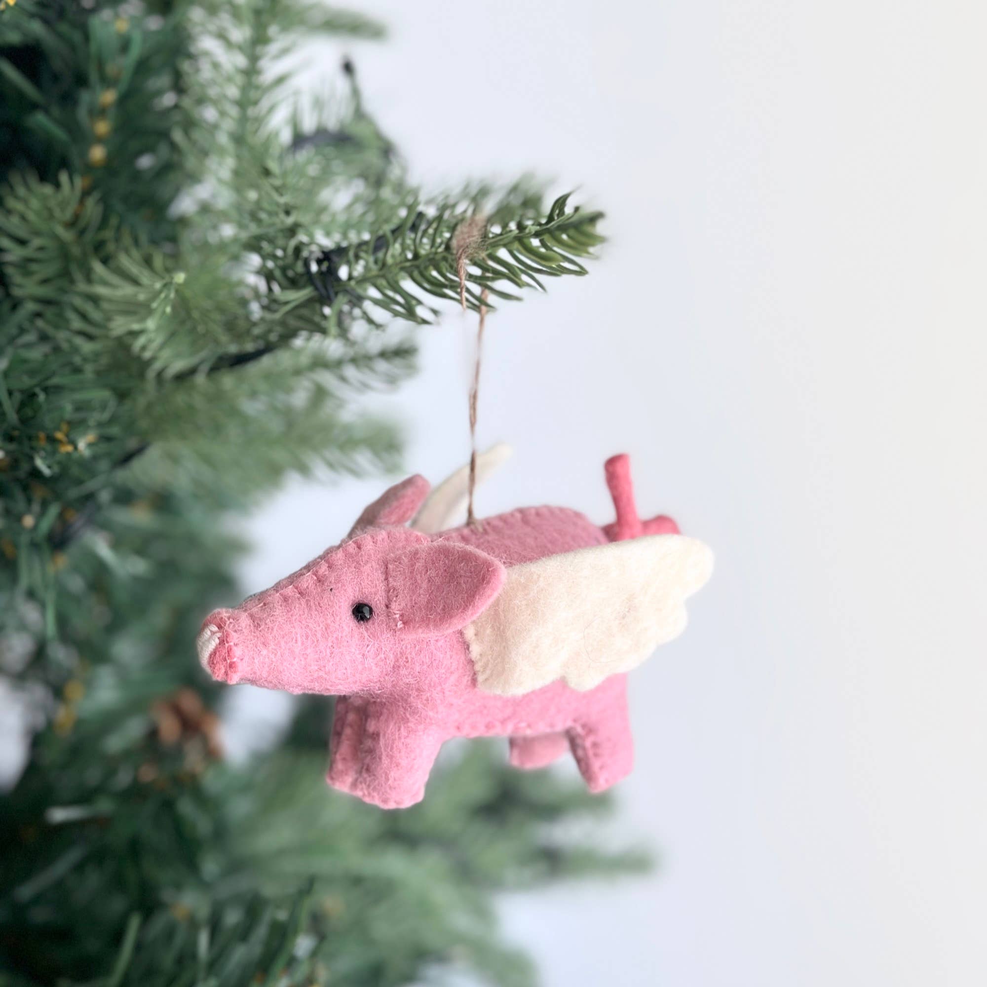 Felt flying pig ornament