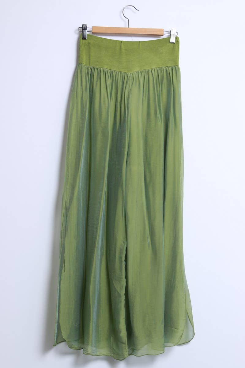 Silk pants open on the sides at the bottom