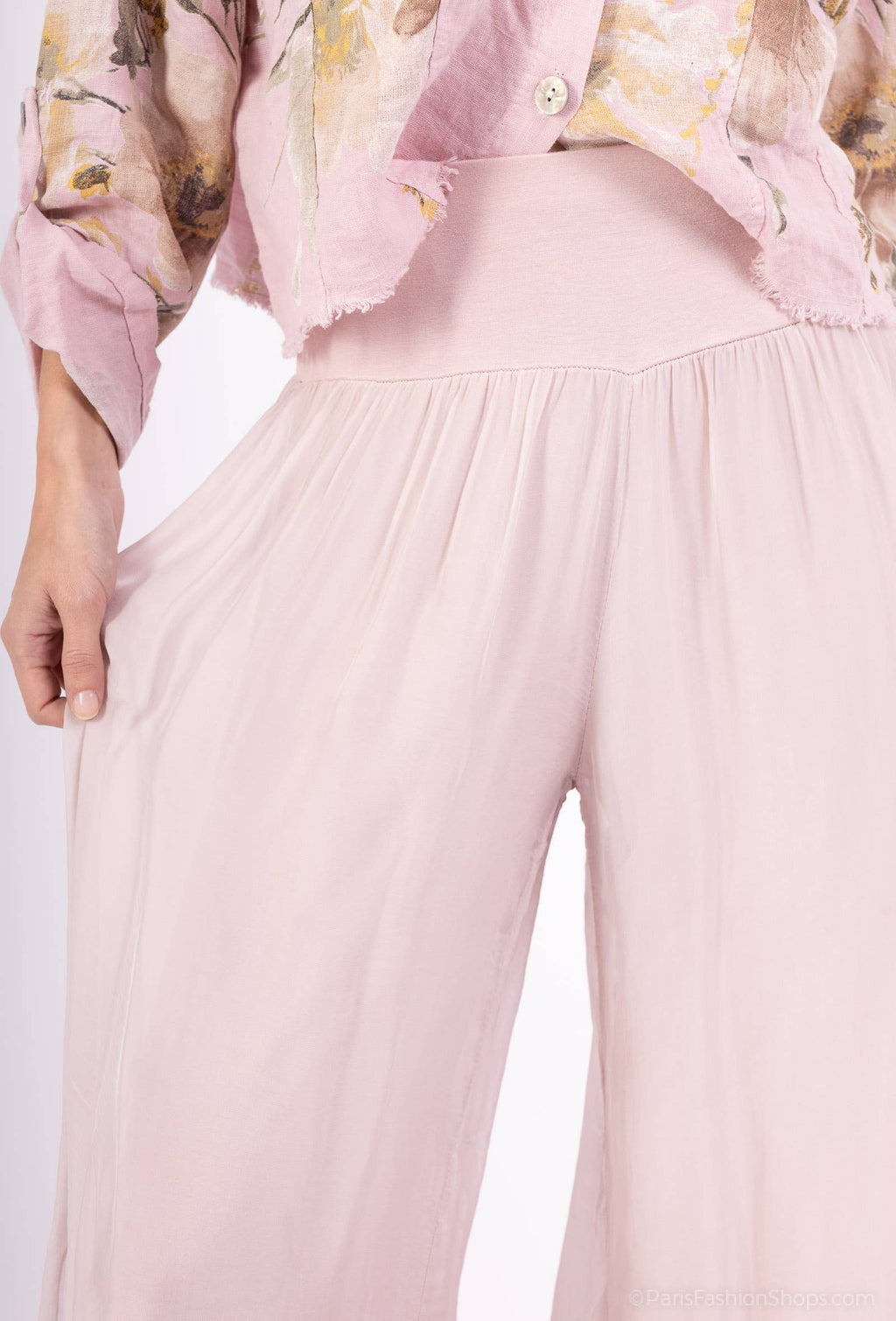 Silk pants open on the sides at the bottom