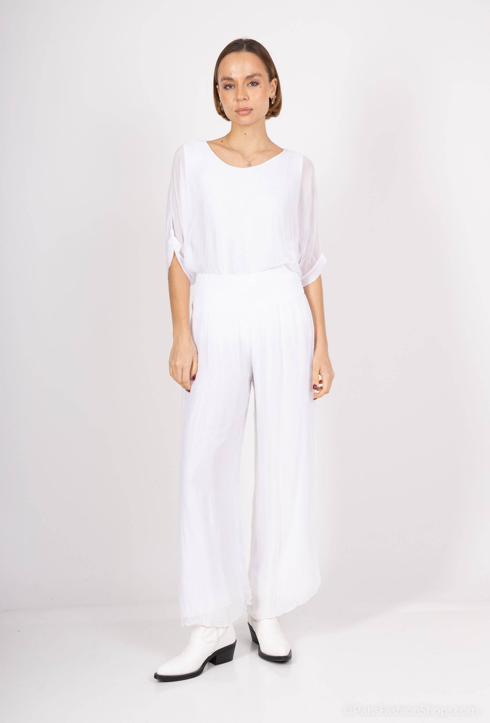Silk pants open on the sides at the bottom