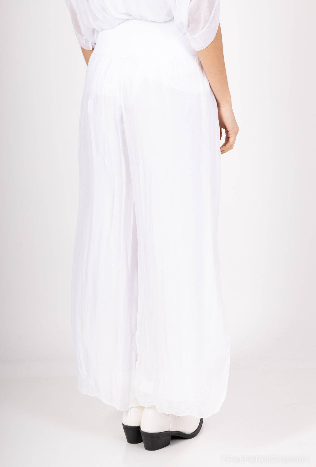 Silk pants open on the sides at the bottom