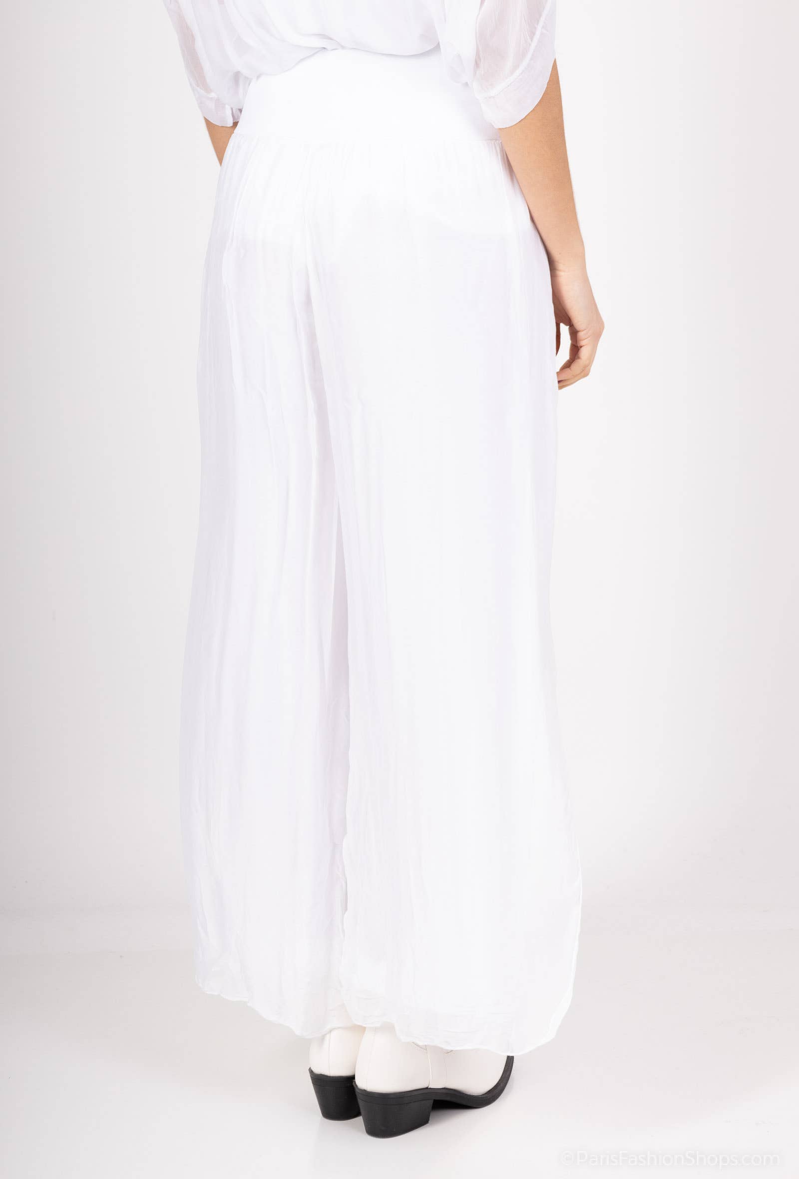 Silk pants open on the sides at the bottom