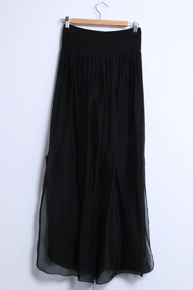 Silk pants open on the sides at the bottom