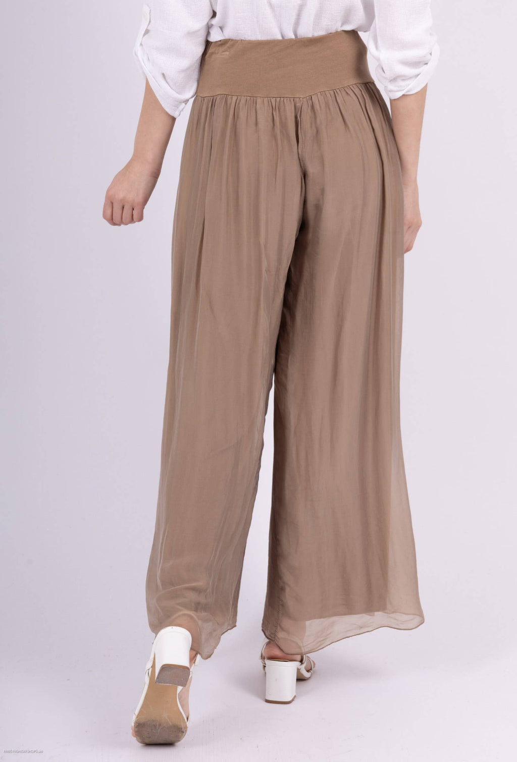 Silk pants open on the sides at the bottom