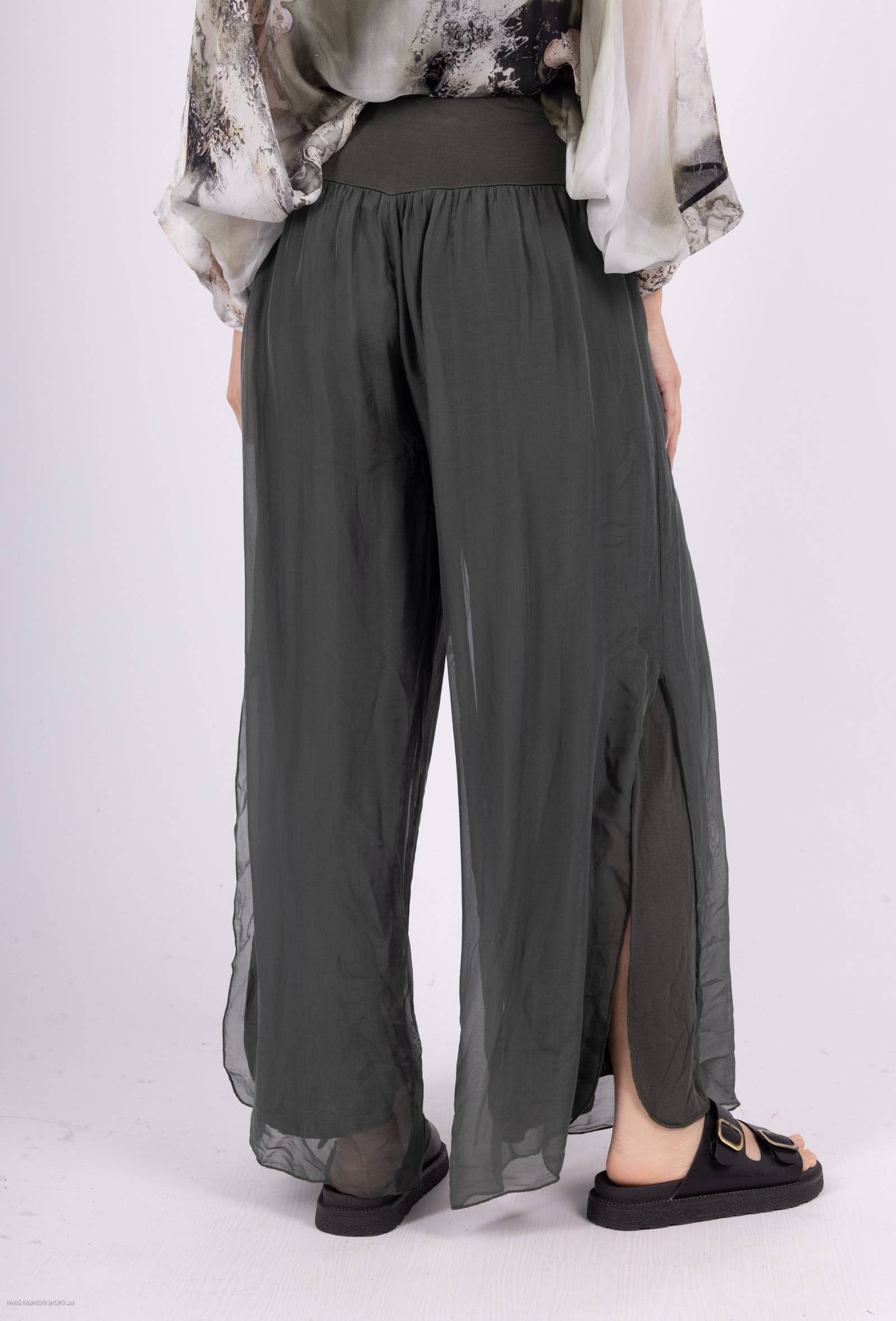 Silk pants open on the sides at the bottom