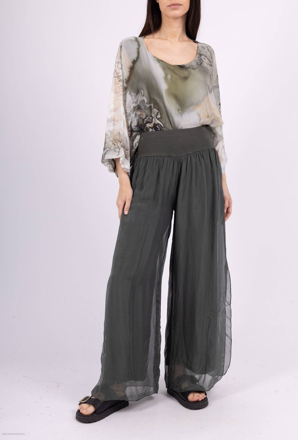 Silk pants open on the sides at the bottom