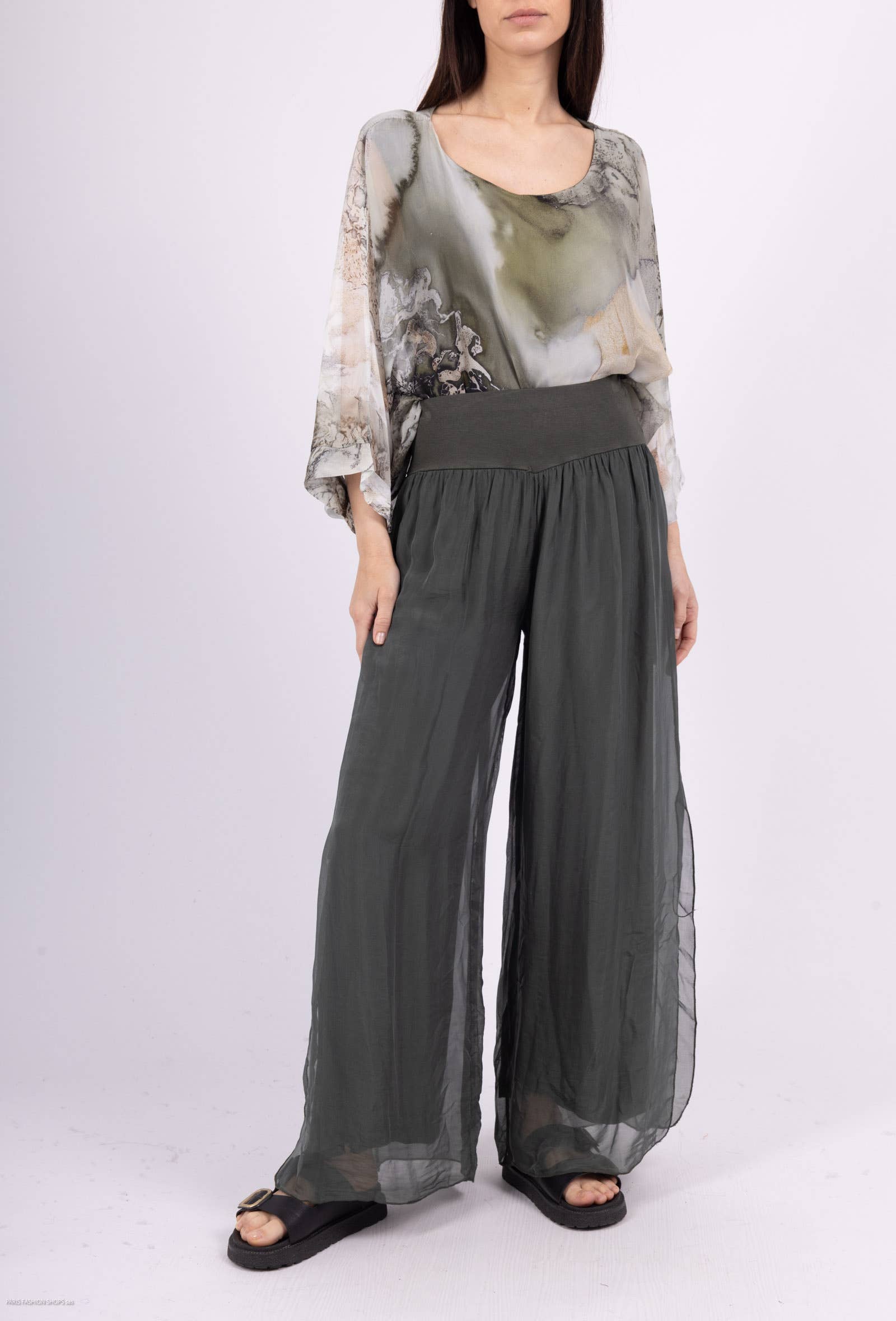 Silk pants open on the sides at the bottom